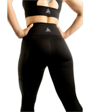 Load image into Gallery viewer, Ignite Apparel High-Waisted Compression Leggings made from recycled polyester, back view
